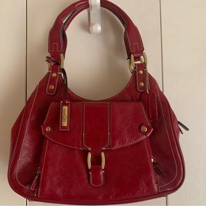 Dark red, maroon shoulder bag, looks brighter in two pictures using the flash